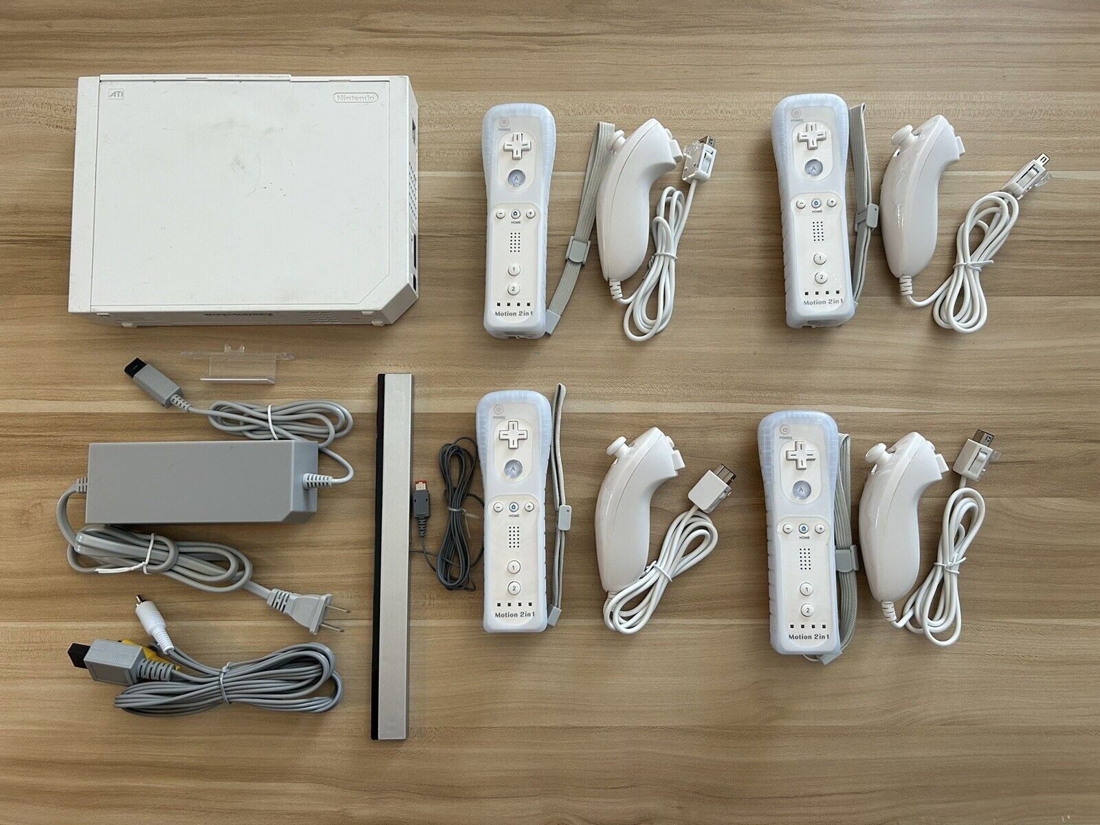 White Nintendo Wii video game system- up to 4 controllers