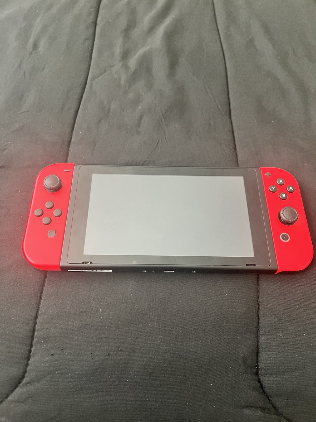 Nintendo Switch Console with Neon Blue and Red Joy-Con Controllers Barely Used