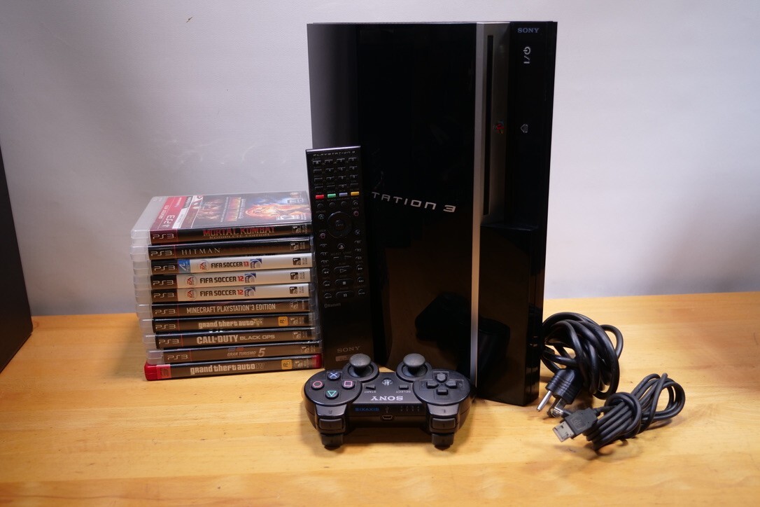 Collectable Play Station 3 CECHG01. Complet.. W / 10 Games