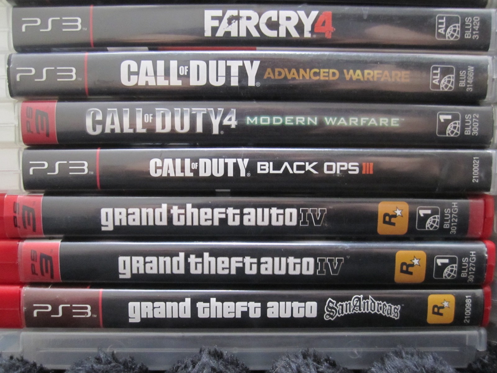 PS3 Lot Including 1 Remote, Power Supply and 29 games