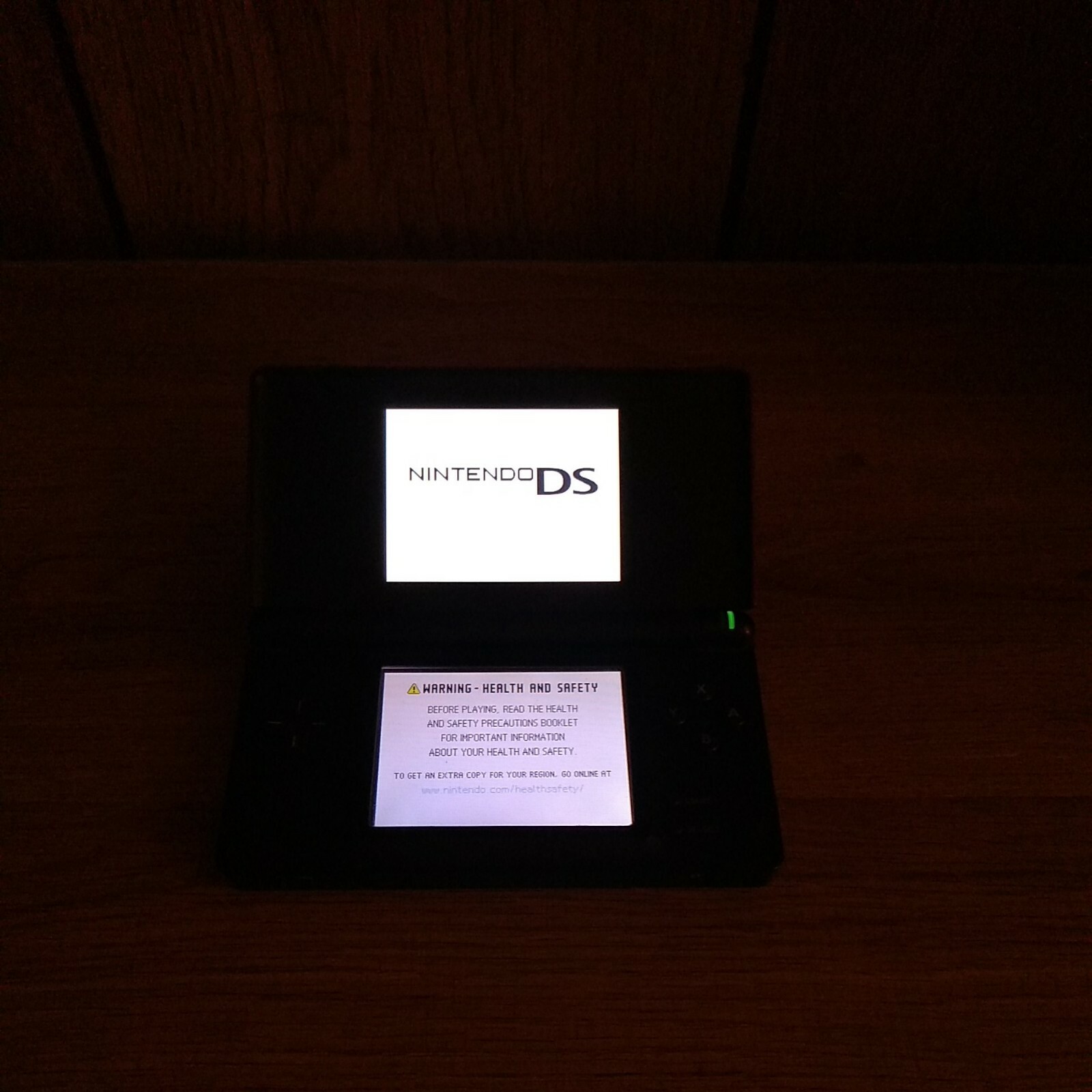 Nintendo DS Lite Handheld Console – Black & Red + 5 games, case, charger, + more