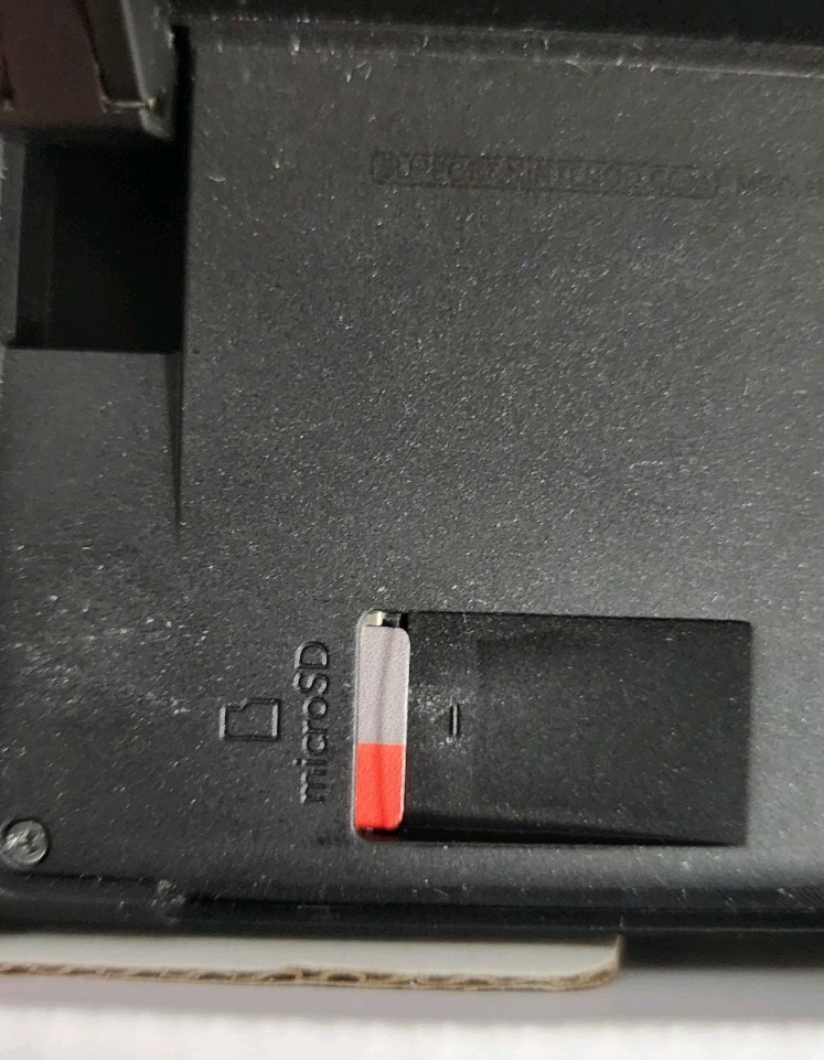 Blue and Red Nintendo Switch OLED – comes wirh 128gb SD card