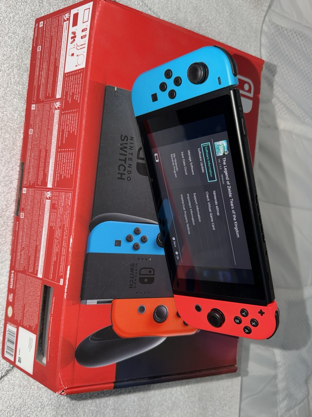 Nintendo Switch 32GB Handheld Console – Neon Red/Neon Blue with 400gb Micro Sd.