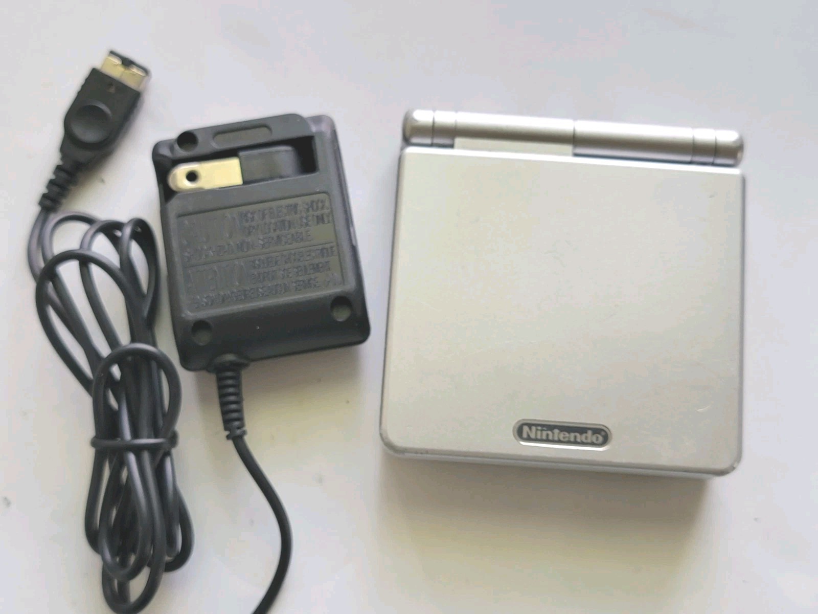 Nintendo Game Boy Advance SP Handheld System WithCharger Silver AGS 001 Working