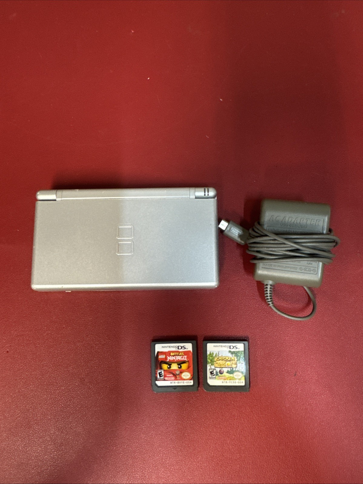 Nintendo DS Lite Console USG-001 with charger Gloss Silver 2 Games