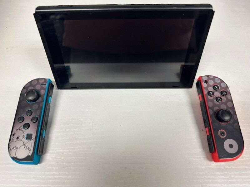 Nintendo Switch 32GB Gray Console with Red and Blue Joycons (Eevee Skin)