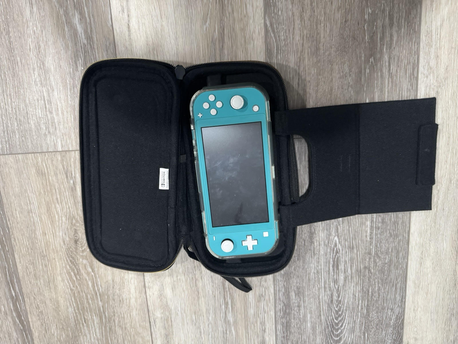 Nintendo Switch Lite 32GB Console – Turquoise, Plus Animal Crossing Case