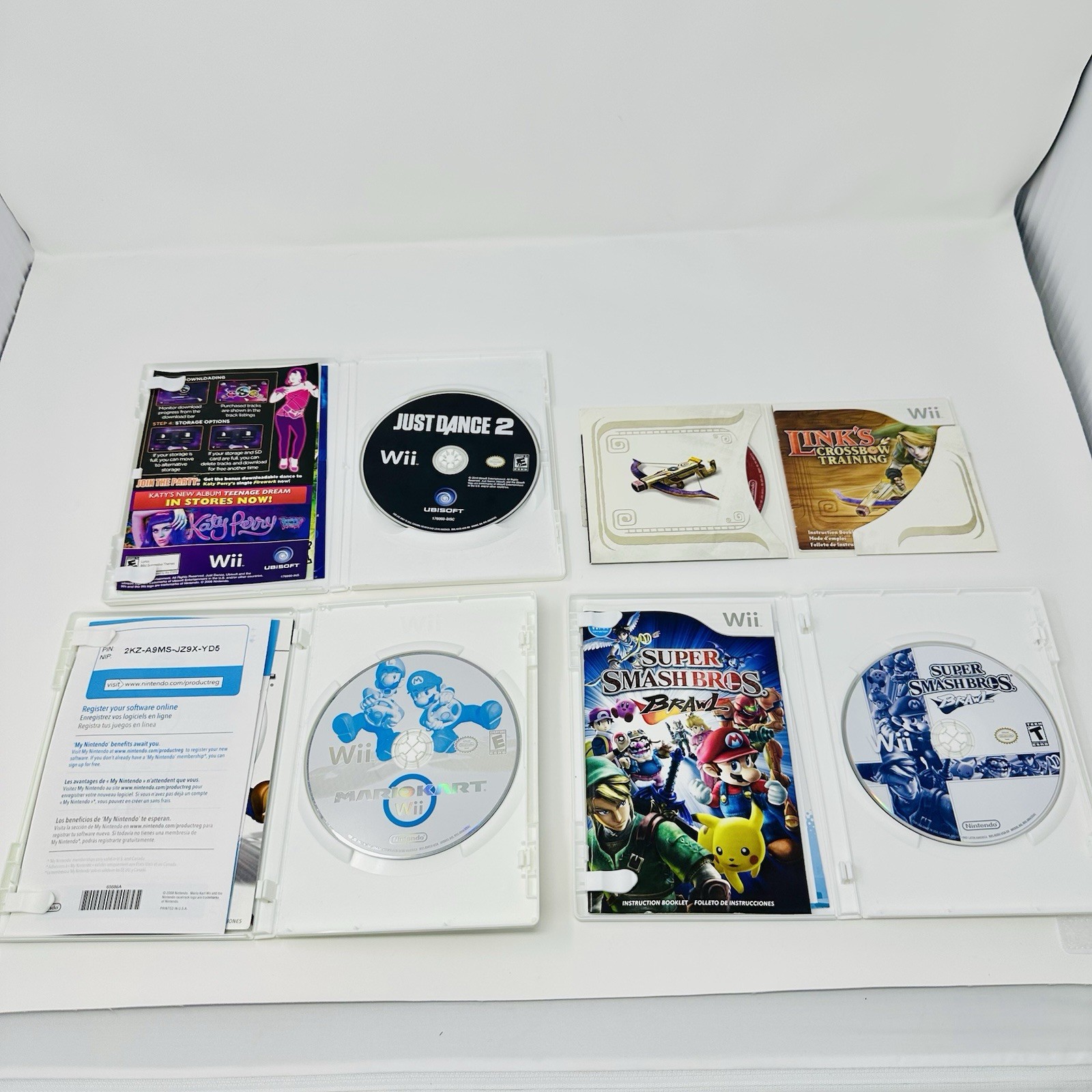 Nintendo Wii Console Bundle RVL-001 Mario Kart Smash Bros 4 Motion Plus 2 Pro