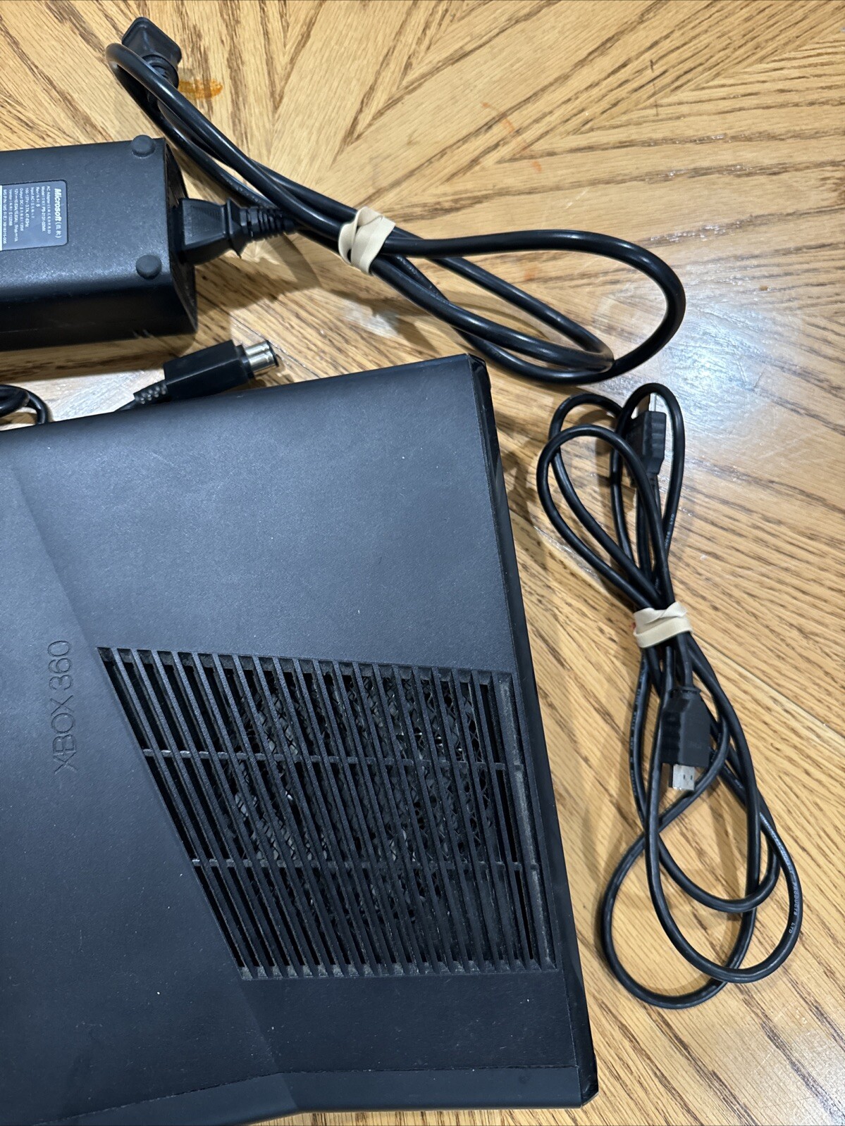 Microsoft XBOX 360S with 2 Controllers 1 Game Madden 25 HDMI Cord and Power Cord