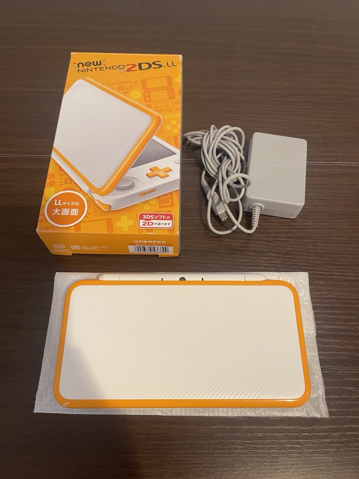 0248 Nintendo New 2DS LL Orange For Parts 400g