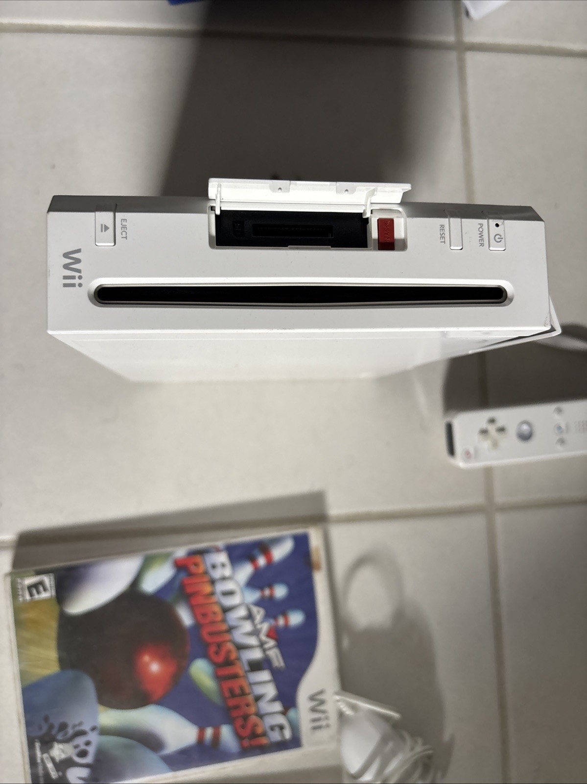 Wii Console With Single Controller And Two Games With Steering Wheel