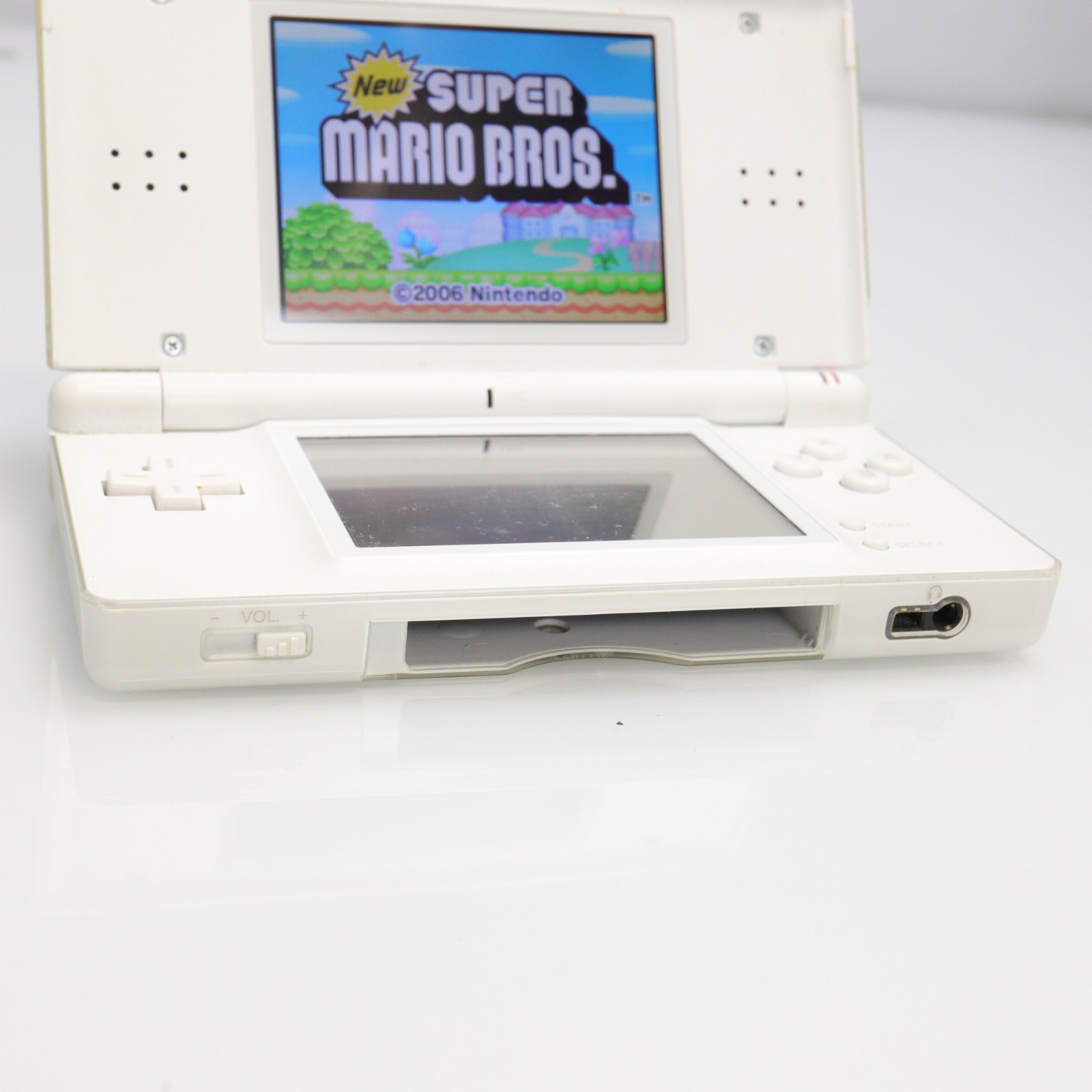 Nintendo DS Lite (USG-001) Handheld with 6 Games & Carrying Pouch – Polar White