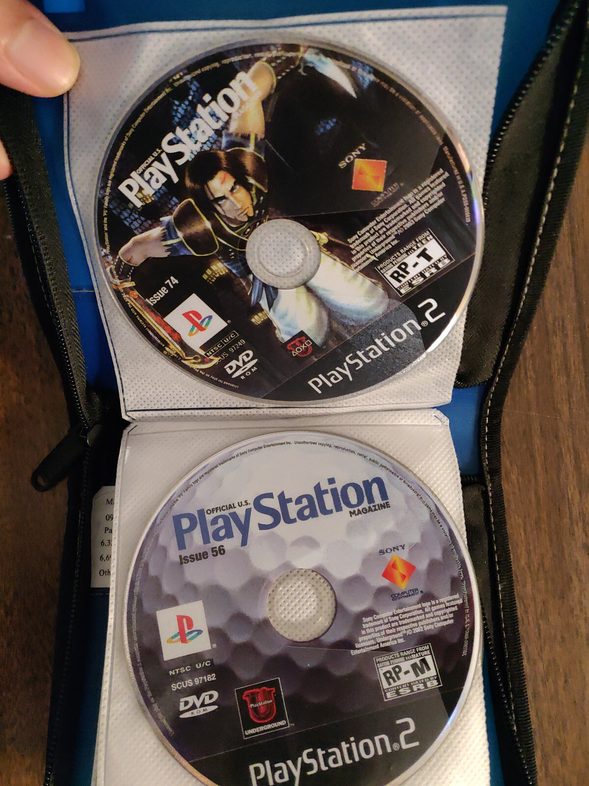 Sony PlayStation 2 Console with controller, memory cards, cables, and 12+ games