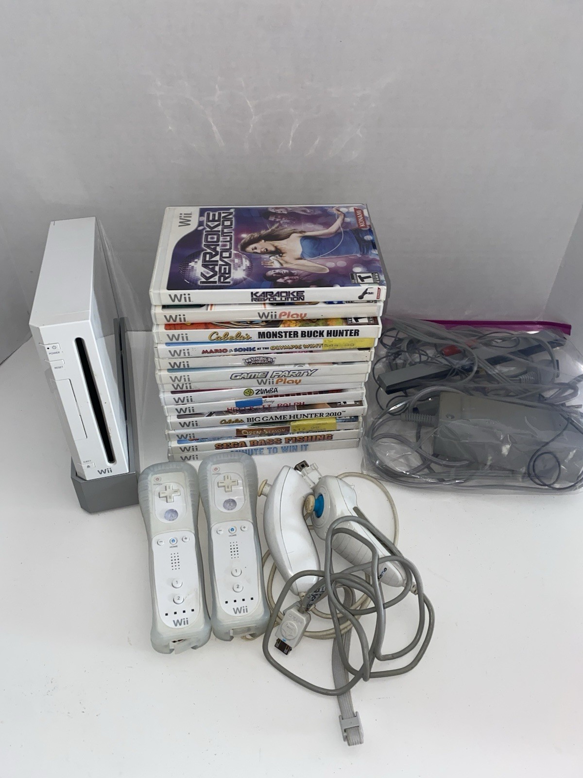 Nintendo Wii Console System Bundle W/ Games And A lot Of Other Accessories. 