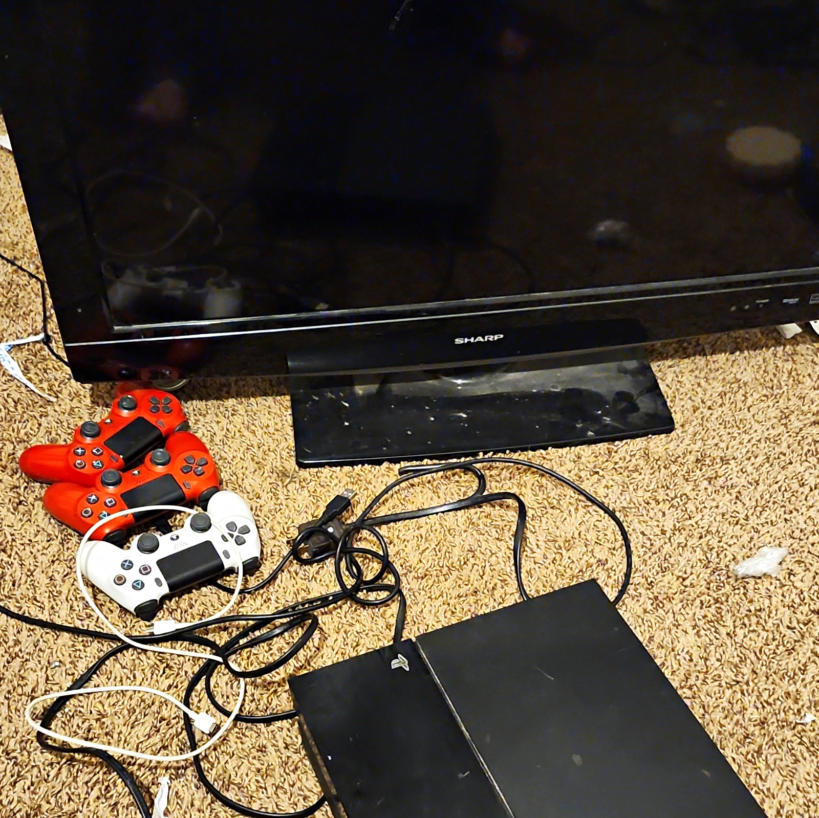 Sony PlayStation 4 (CUH-1001A) 500GB 3 DualShock Controllers, TV, And Four Games