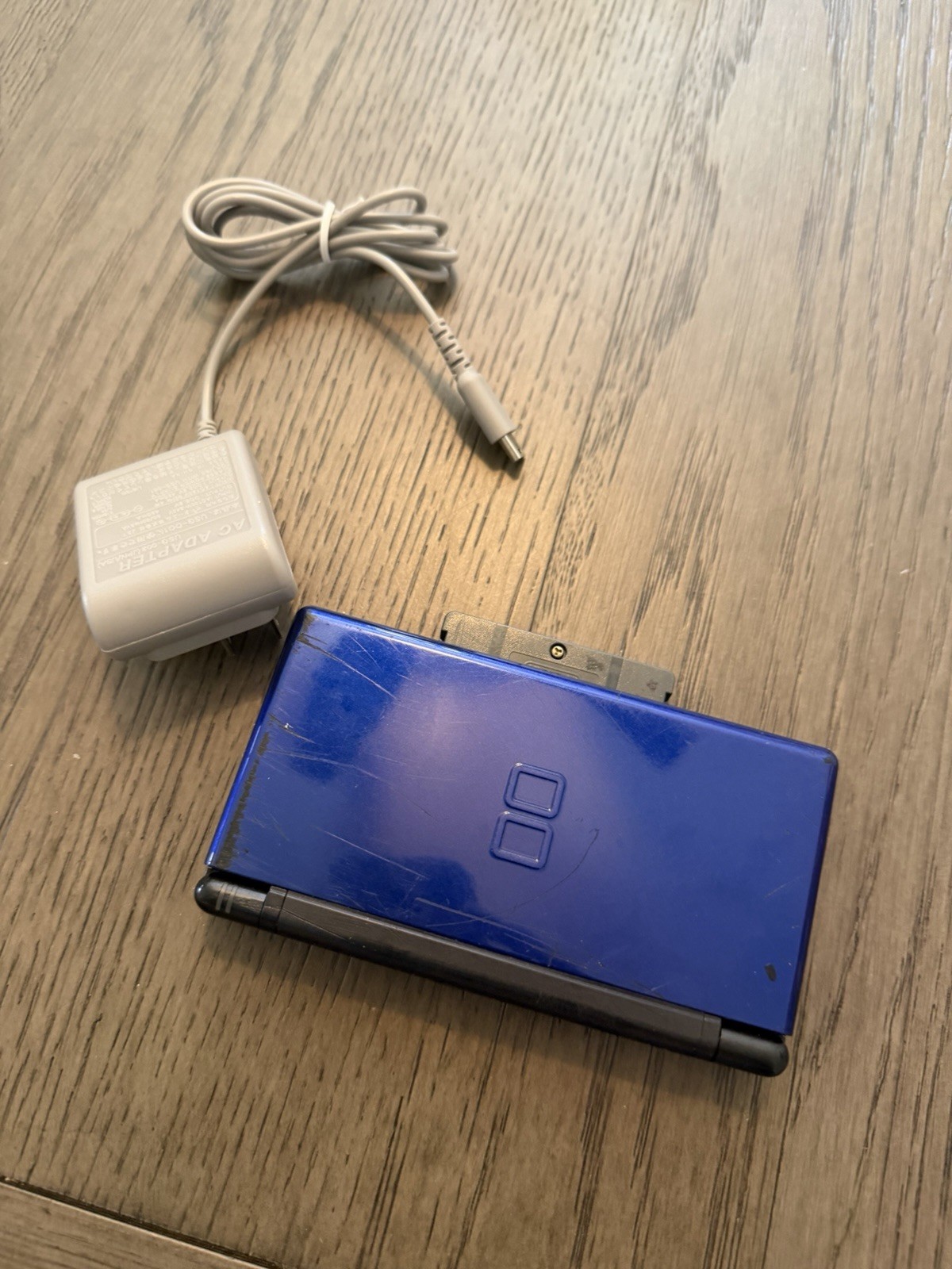 Nintendo DS Lite Handheld System Blue/Black w/ Charger (missing stylus) & Game