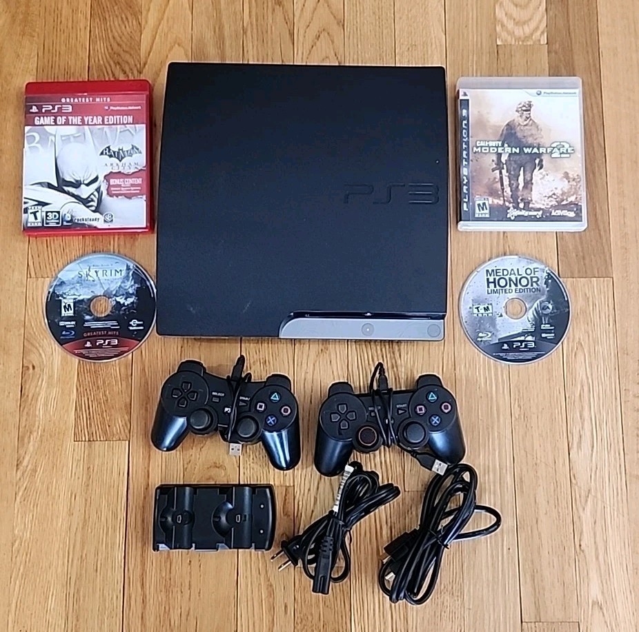 PlayStation 3 Slim Bundle – 2 Controllers, Charging Station, 4 Games Tested