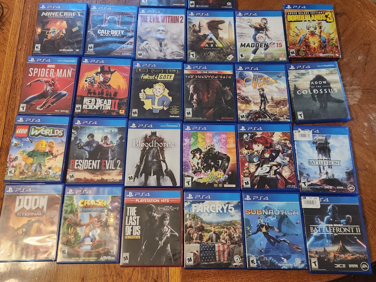 PS4 Slim Bundle, 2 Sony Controllers, 26 Games- RDR2 Spider-Man Persona 5 + More
