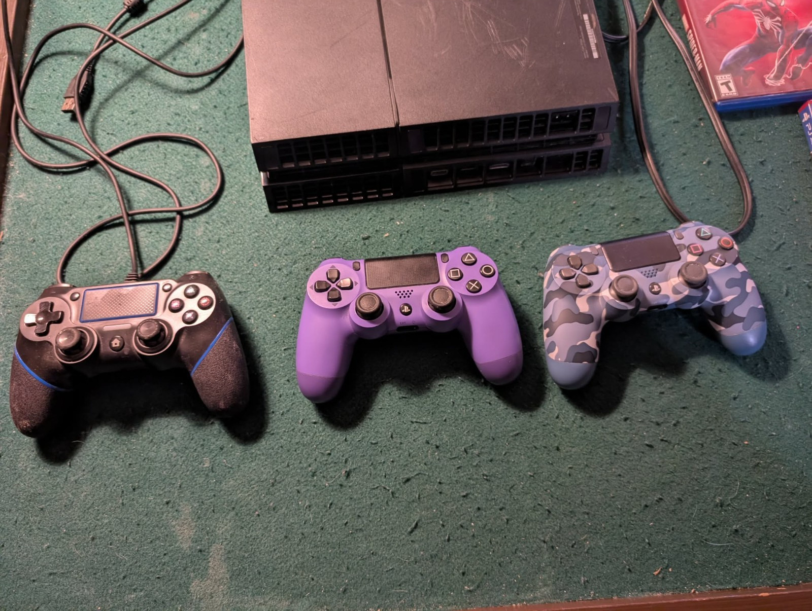 Sony PlayStation 4, game, and controller bundle. 5 games, three controllers.