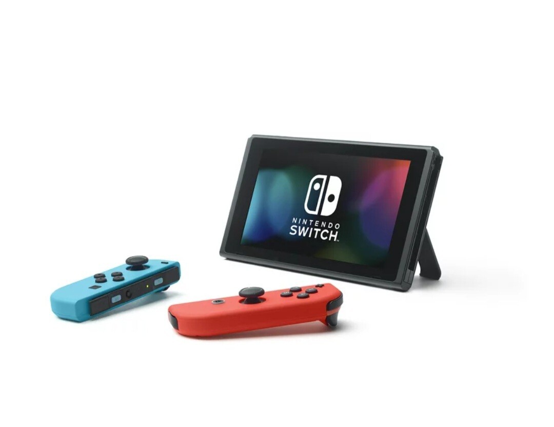 Nintendo Switch plus bonus mystery gift!! Blue and Red Joy-Con Controllers