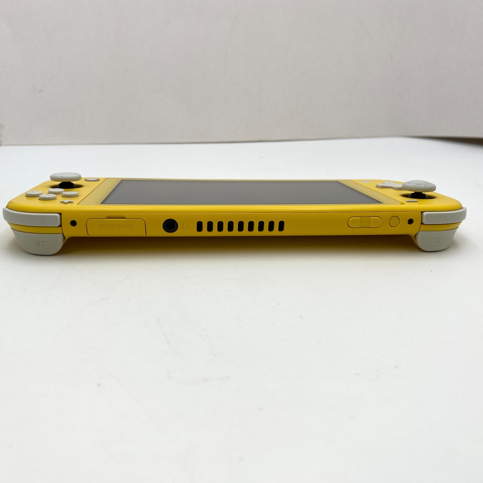 Nintendo Switch Lite – Yellow – Game Console – Fair Condition