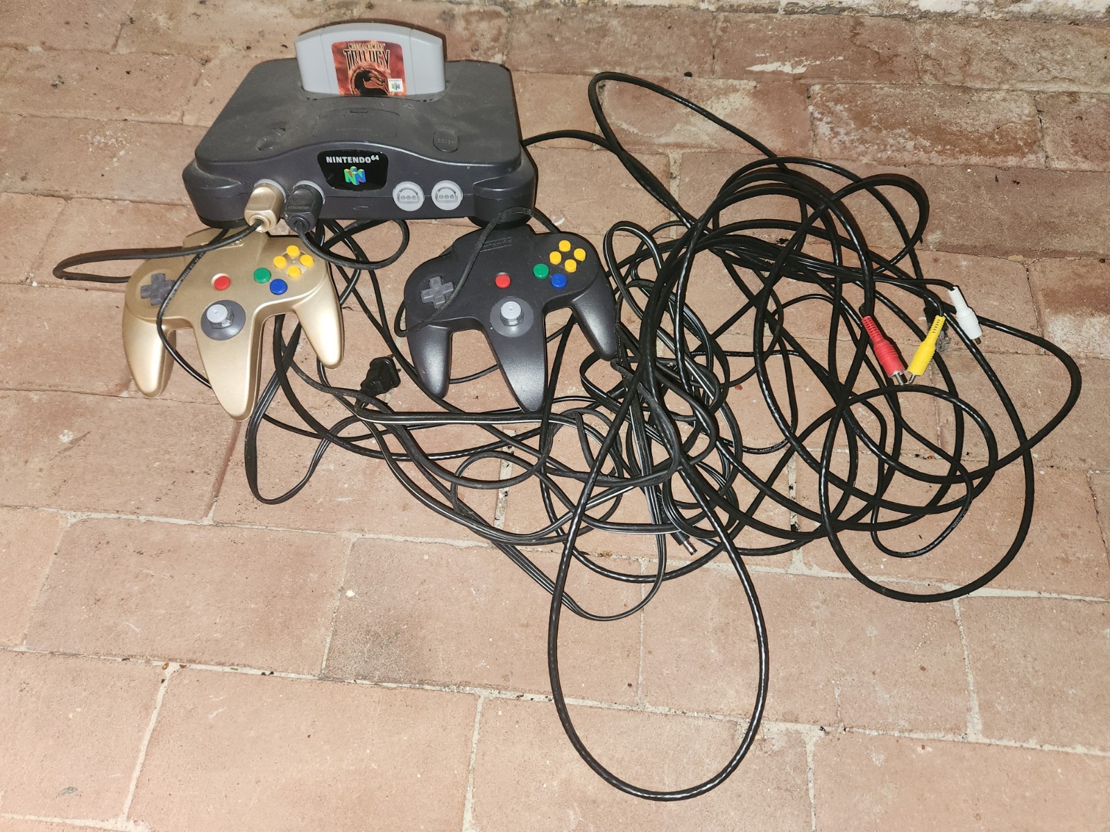 Nintendo 64 Home Console – Black with Mortal Kombat Trilogy cartridge