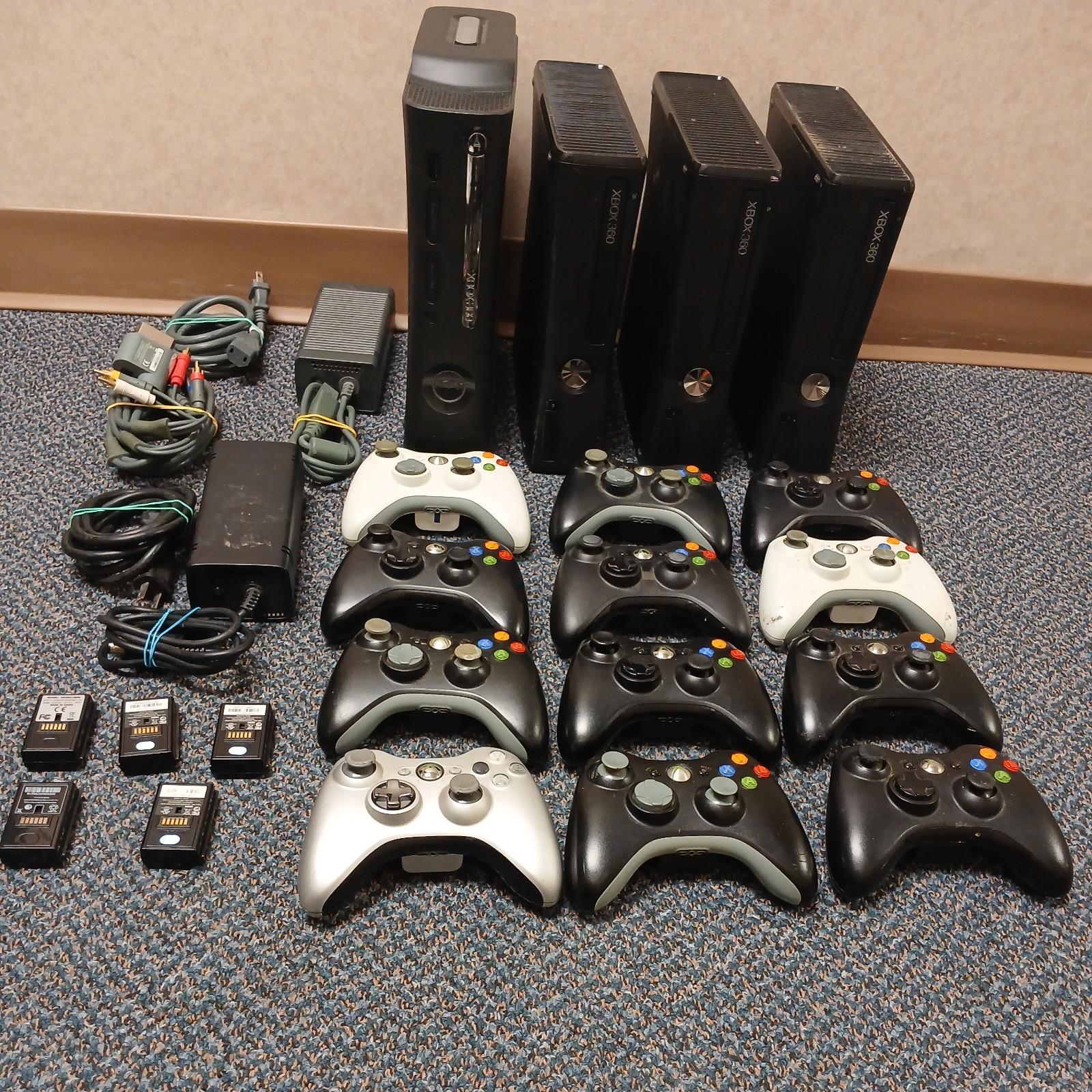 Lot Of 4 Xbox 360, 9 controllers. Most work the other for parts or repair.