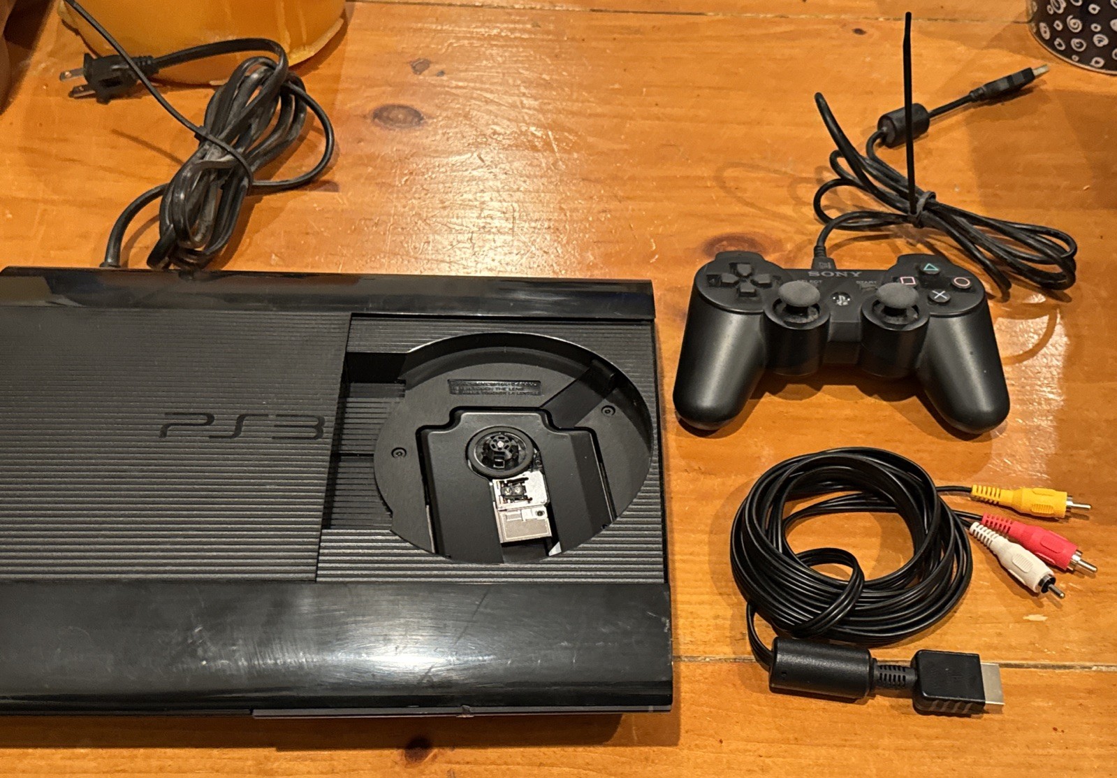 PS3 Super Slim CECH-4201C 500GB Console Bundle PlayStation 3, Controller, Remote