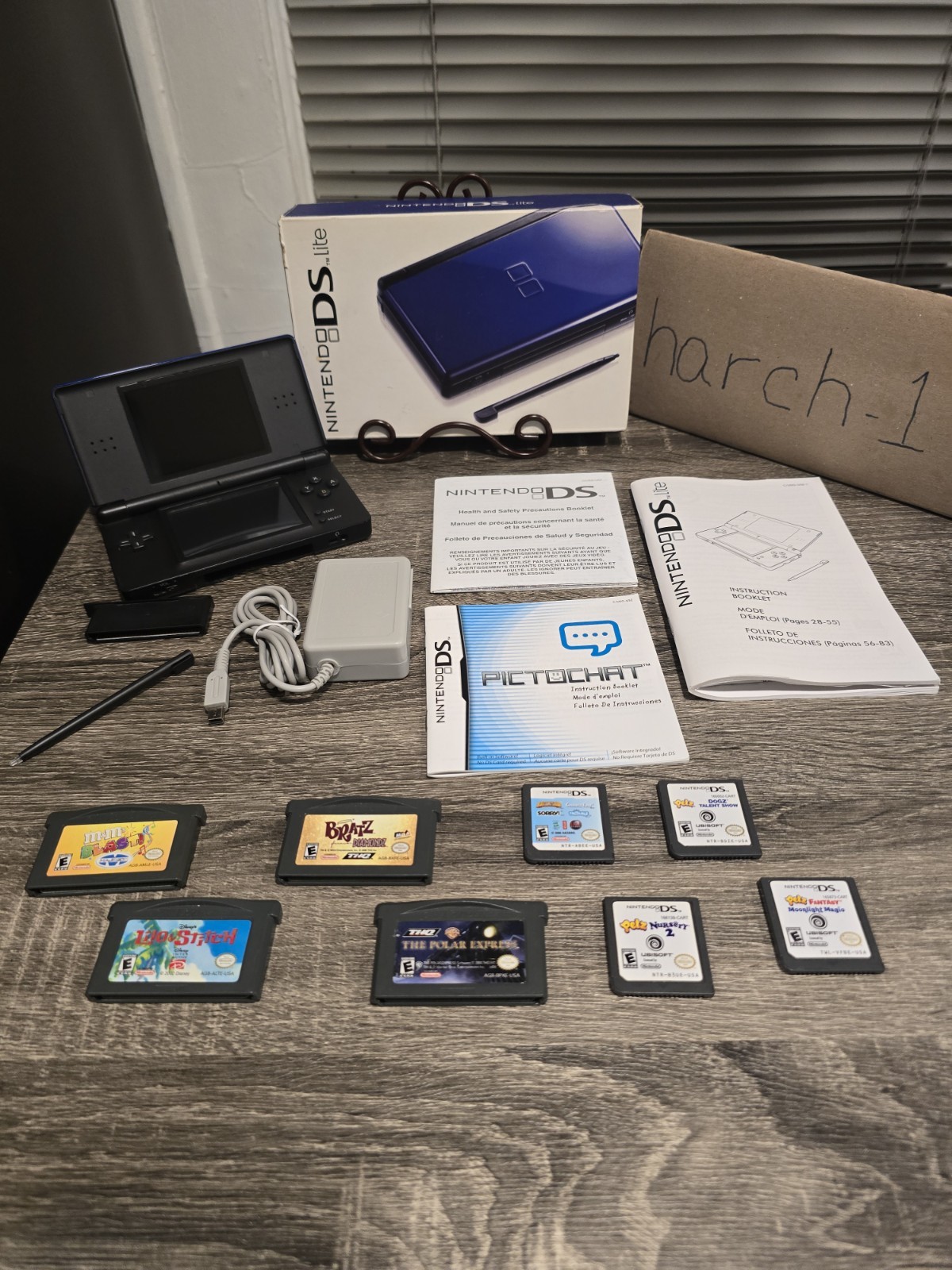 Nintendo DS Lite Handheld System – Cobalt/Black + Manuals & 8 Games Bundle