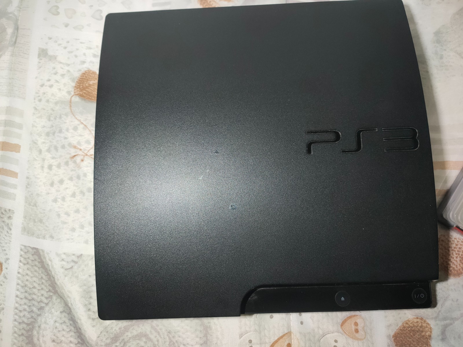 Sony Playstation 3 Slim PS3 Console with 6 Games, Trust GXT Controller and Cables.
