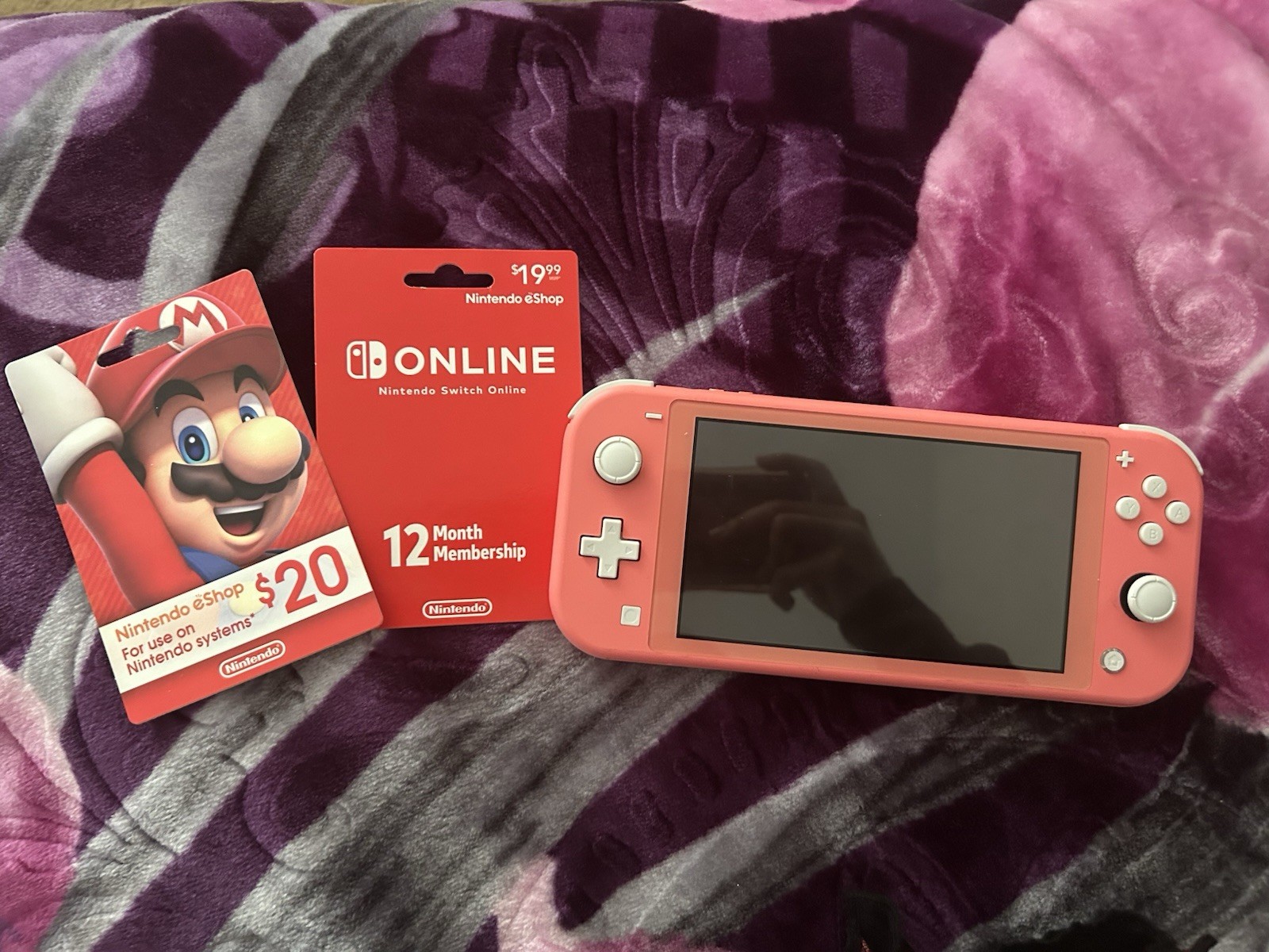 Nintendo Switch Lite Coral Console with eShop $20 Card & Switch Online 12 Month