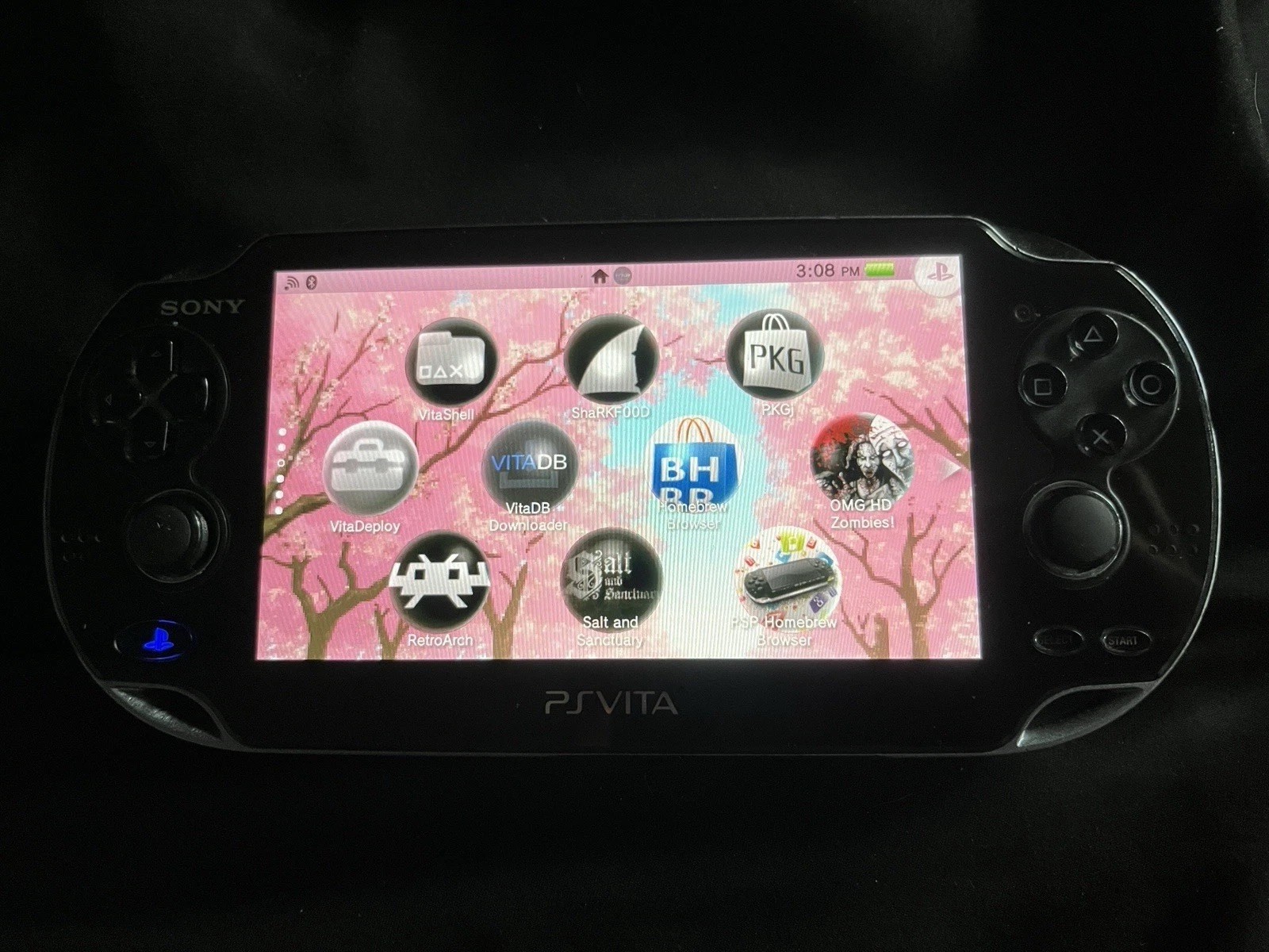 PS VITA 16GB with charger, 4GB memory card, one game and case