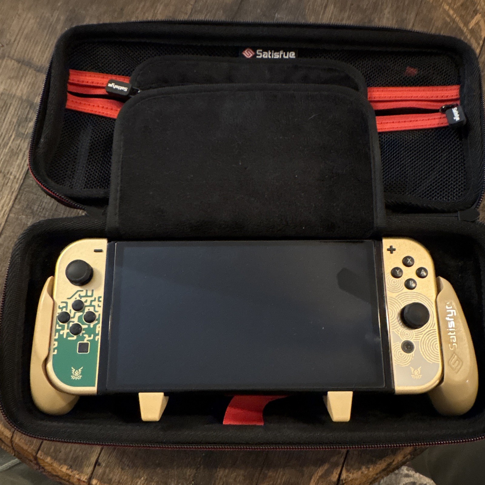 Tears of The Kingdom LE Switch OLED with Satisfye grip and case.