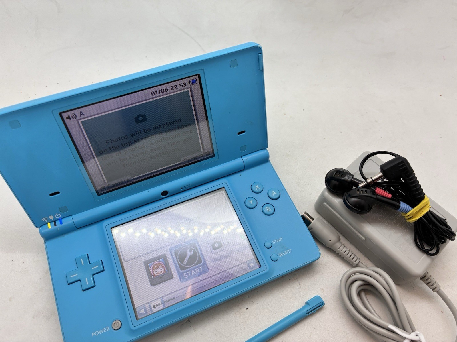 Nintendo DSi Blue Handheld Console (READ). Tested With Stylus, Earbuds Charger