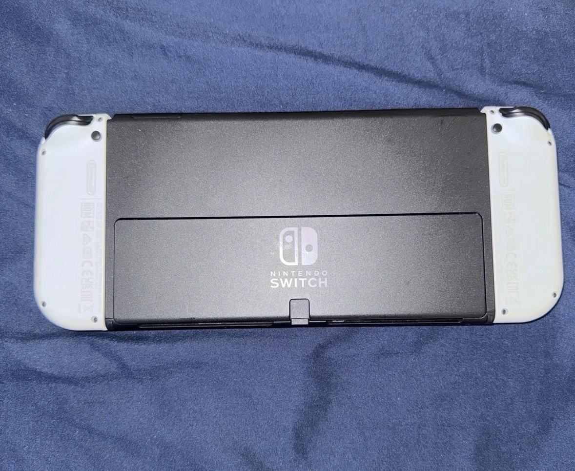 Nintendo Switch OLED + charging dock accessories for joycon