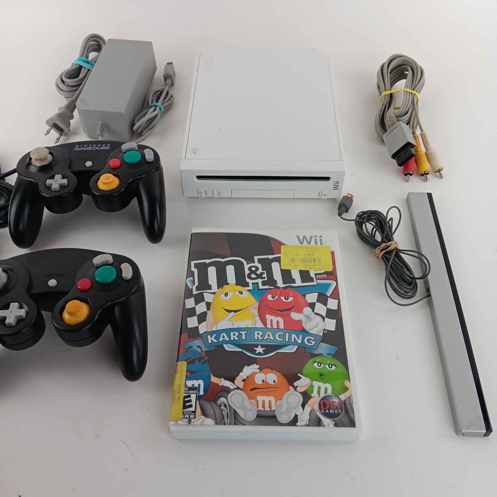 Wii Bundle 2 Game Cube Controlers, M&M Cart Racing. Worn Pad On 1 Right Toggle,