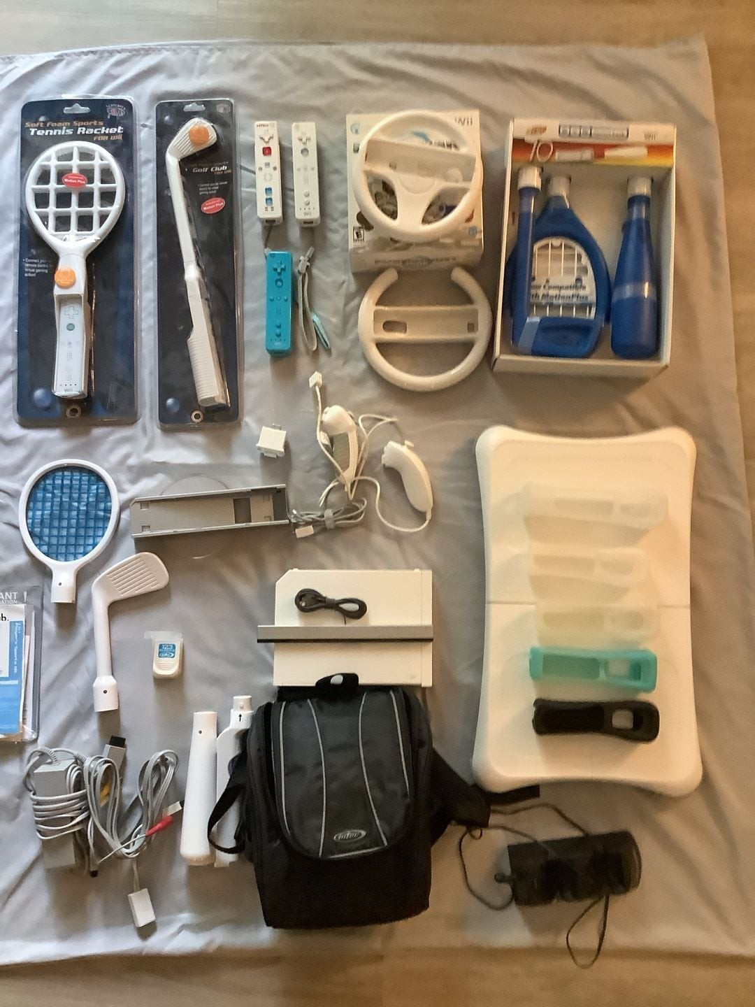 Nintendo Wii Console Bundle with Wii Balance Board, Nerf Sports Pack, and Contro