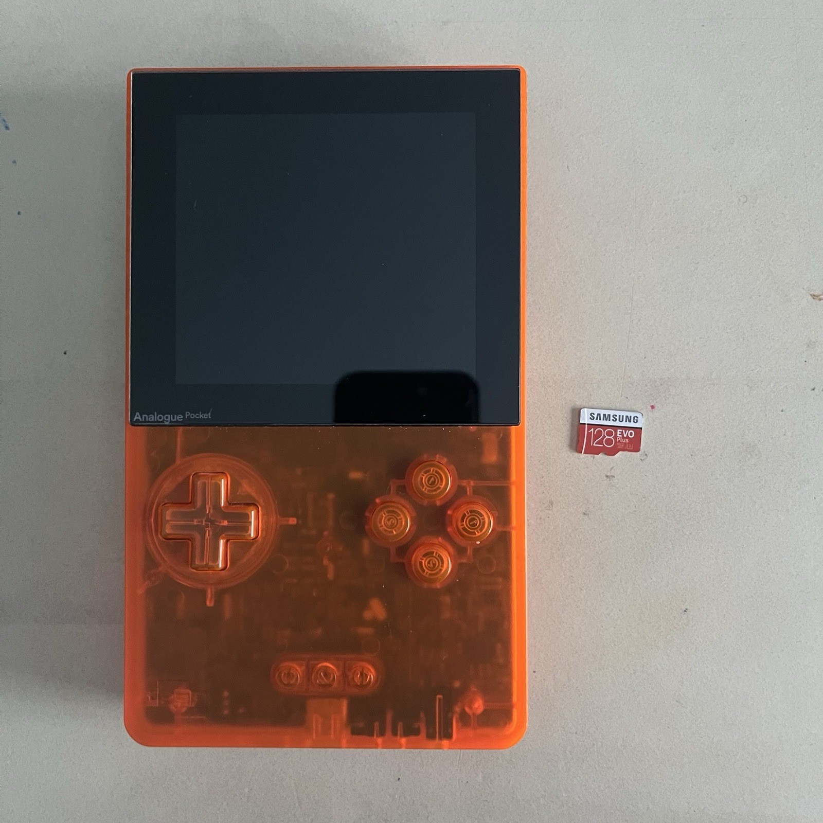 Analogue Pocket Transparent Orange Handheld System W/ 128gb SD Card (Scratched)