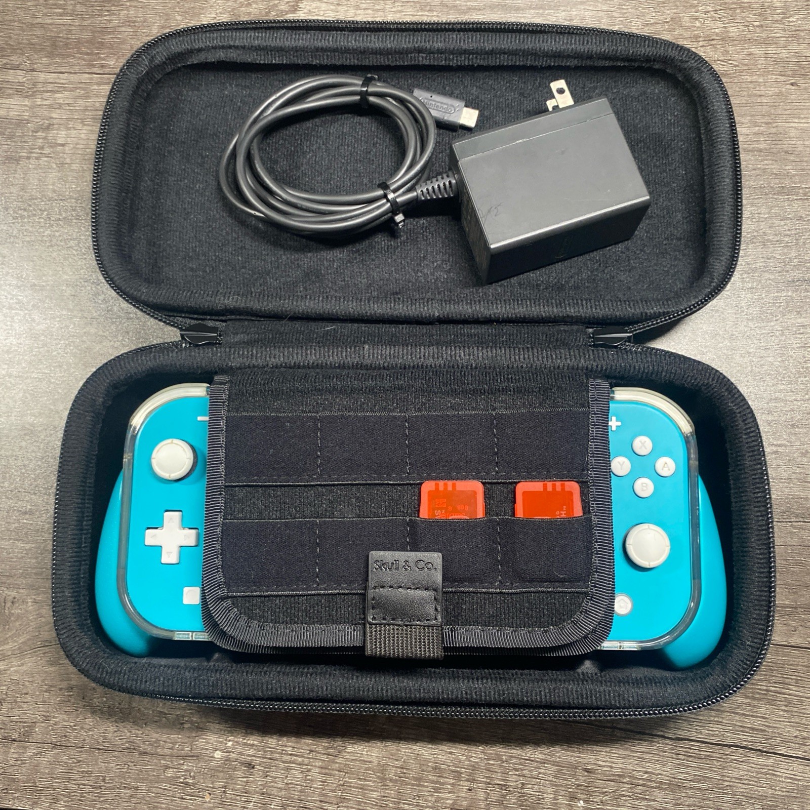 Nintendo Switch Lite (Turquoise) w/ Charger, Case, Grip & 128 GB MicroSD Card