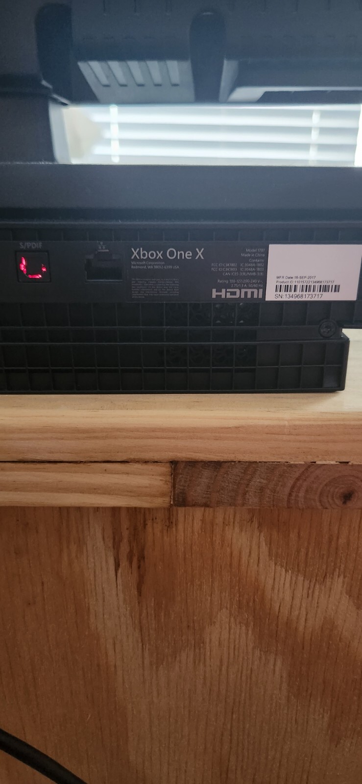Xbox One X 1 TB console with all cables, controller, and Magnavox TV