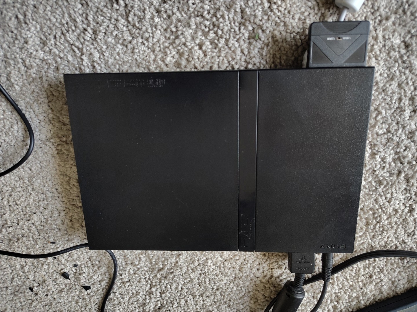 PlayStation 2 Slim Console – Black Comes With A Random Game As Well Bundle