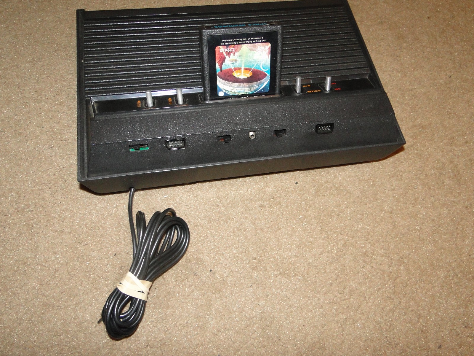 VINTAGE ATARI W/2CONTROLLERS &4 GAMES IT USED TO WORK BEEN YEARS NOT TESTED