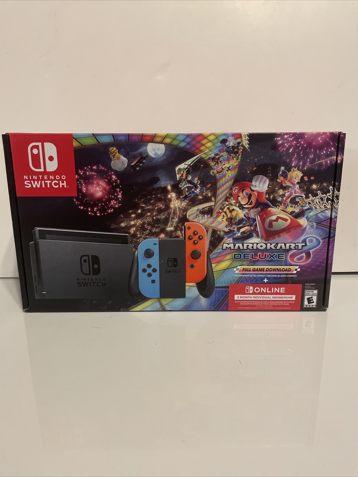 Nintendo Switch with Blue and Red Joy-Con Controllers and Mario Kart 8 Bundle