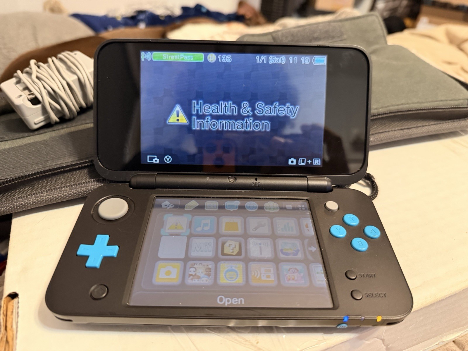 Nintendo 2DS XL Handheld Console with Mario Kart 7 Bundle – Black/Turquoise