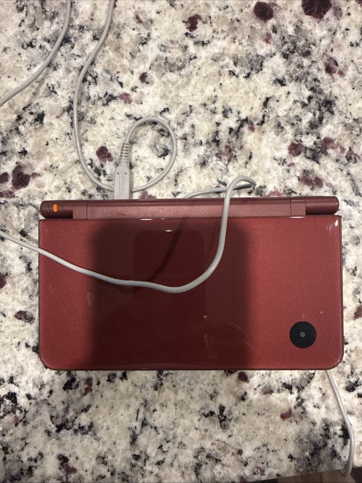Nintendo DSI XL Handheld System Burgundy with An Extra 130 Games