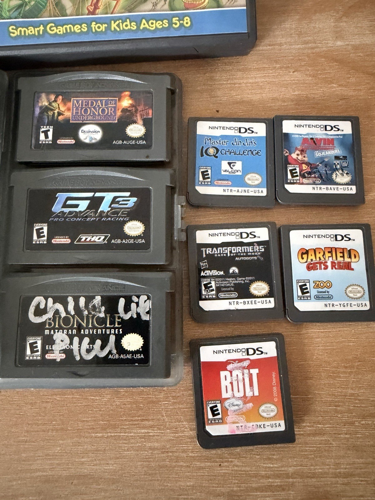 Nintendo DS Lite Handheld Console Bundle W/ 9 Games Charger Stylus Advance