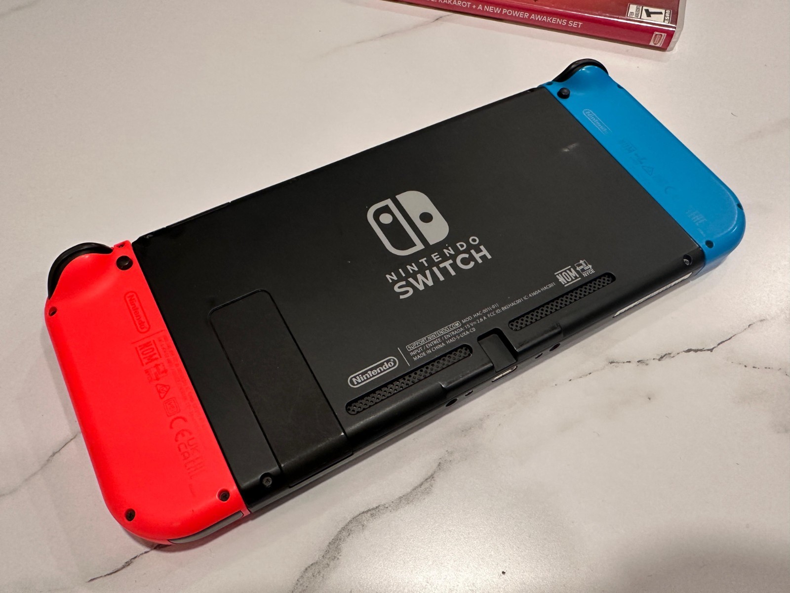 Nintendo Switch 32GB Black Console with Neon Red and Neon Blue Joy-Con