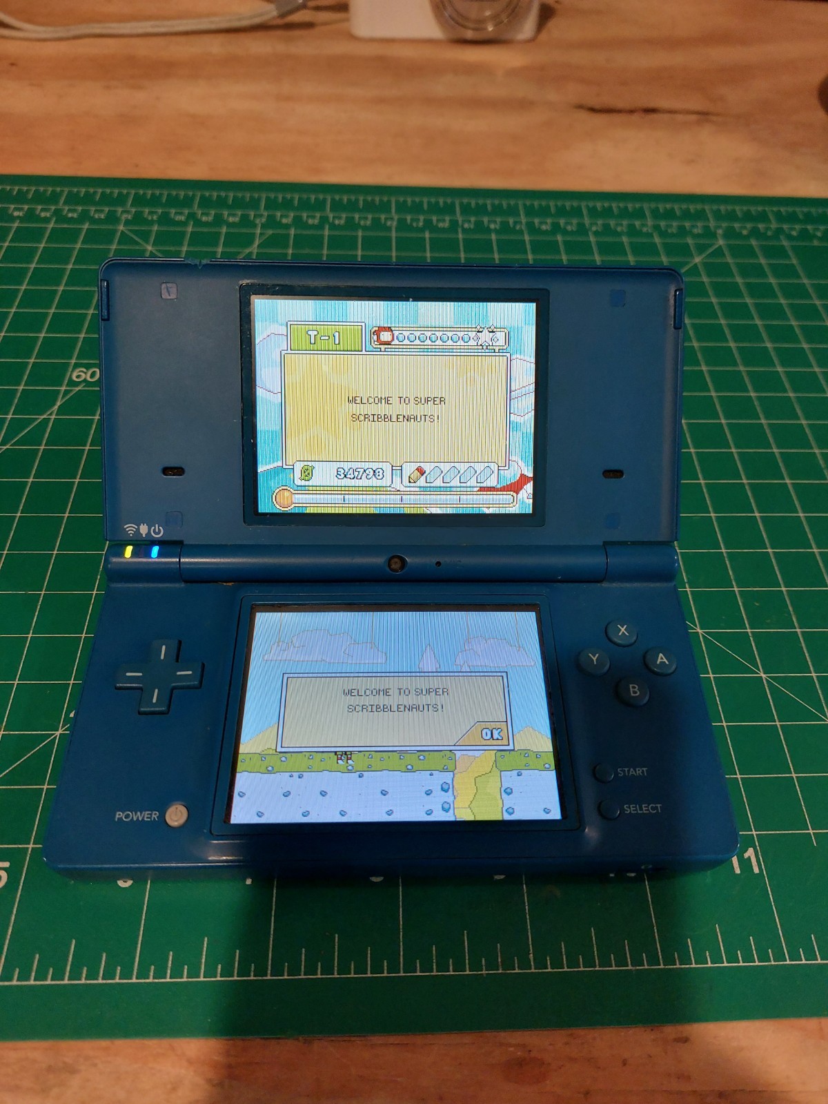 Nintendo DSi Blue Tested Working Console with Super Scribblenauts