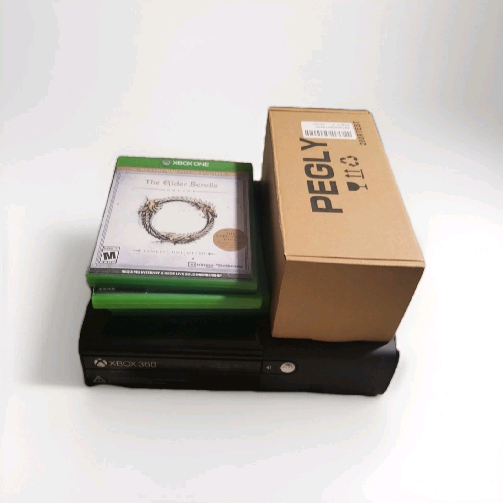 Xbox 360 E Console No Controller with Video Games and Cables Bundle