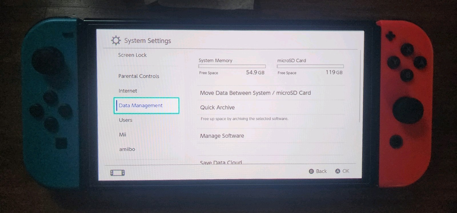Blue and Red Nintendo Switch OLED – comes wirh 128gb SD card